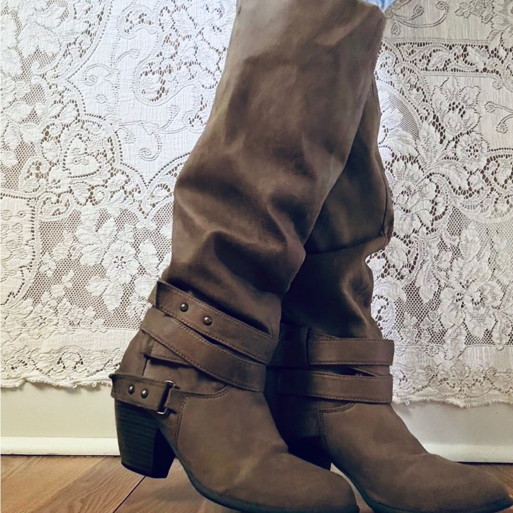 brown Shi by Journeys knee-high heeled buckled boots.